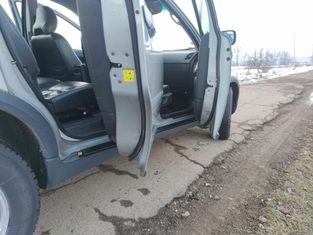 Серый Вольво ХС90, объемом двигателя 2.4 л и пробегом 275 тыс. км за 4200 $, фото 9 на Automoto.ua