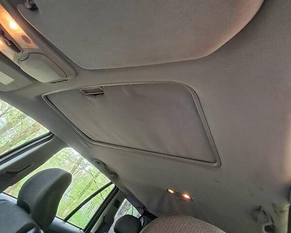 Серый Вольво ХС90, объемом двигателя 2.4 л и пробегом 320 тыс. км за 9400 $, фото 12 на Automoto.ua