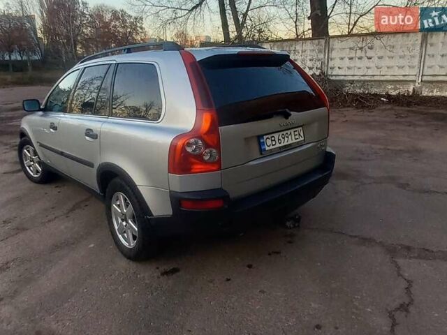 Серый Вольво ХС90, объемом двигателя 2.4 л и пробегом 417 тыс. км за 11000 $, фото 1 на Automoto.ua