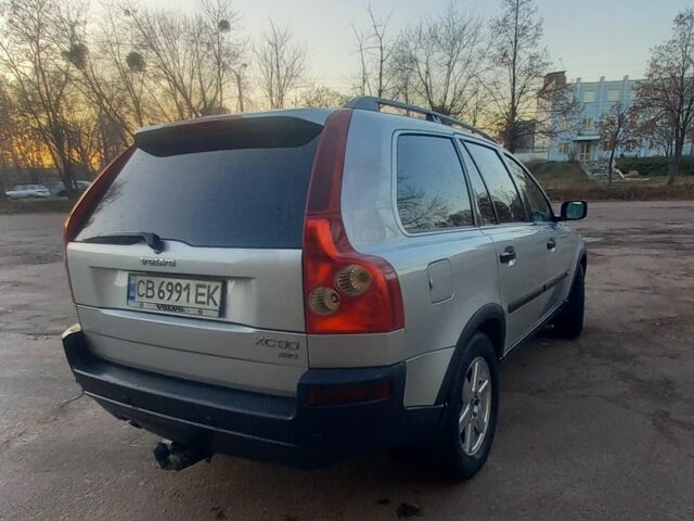 Серый Вольво ХС90, объемом двигателя 2.4 л и пробегом 417 тыс. км за 10500 $, фото 3 на Automoto.ua