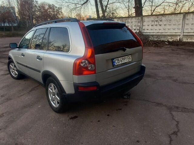 Серый Вольво ХС90, объемом двигателя 2.4 л и пробегом 417 тыс. км за 10500 $, фото 2 на Automoto.ua