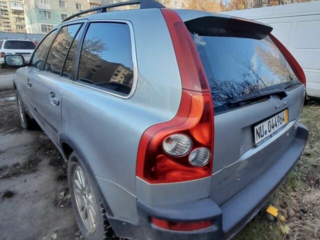 Серый Вольво ХС90, объемом двигателя 2.4 л и пробегом 385 тыс. км за 7000 $, фото 1 на Automoto.ua