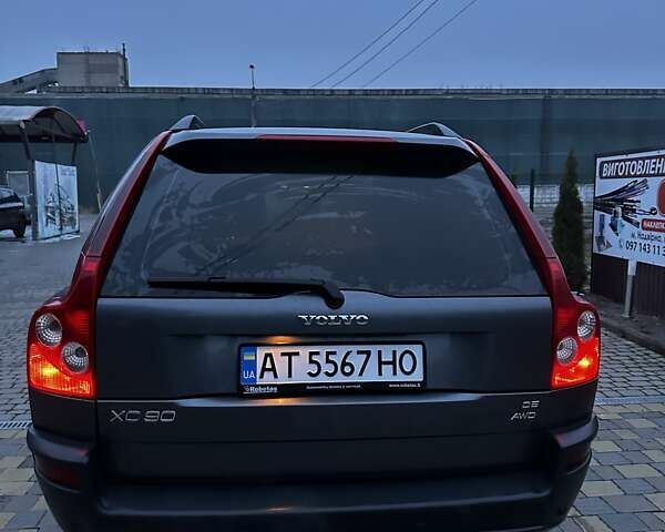 Серый Вольво ХС90, объемом двигателя 2.4 л и пробегом 402 тыс. км за 7500 $, фото 4 на Automoto.ua