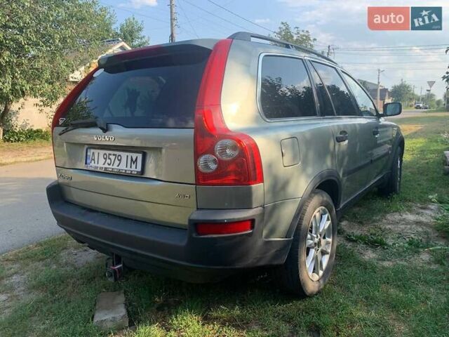 Серый Вольво ХС90, объемом двигателя 2.5 л и пробегом 230 тыс. км за 14200 $, фото 2 на Automoto.ua