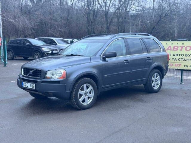 Серый Вольво ХС90, объемом двигателя 2.4 л и пробегом 238 тыс. км за 4900 $, фото 1 на Automoto.ua