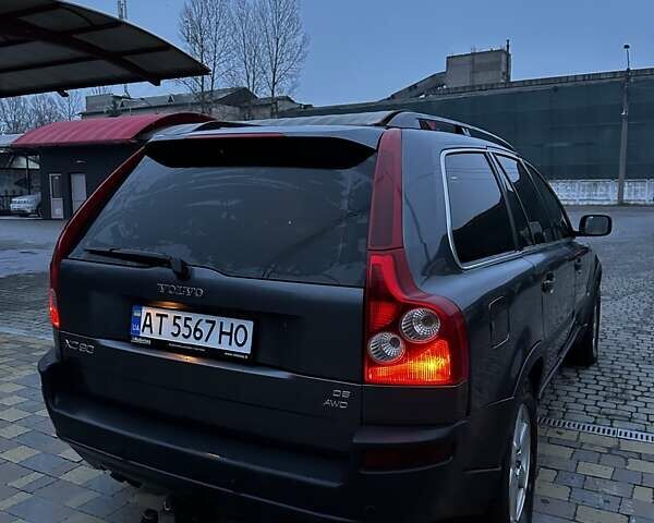 Серый Вольво ХС90, объемом двигателя 2.4 л и пробегом 402 тыс. км за 7500 $, фото 2 на Automoto.ua