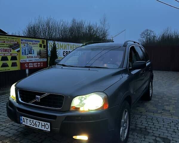 Серый Вольво ХС90, объемом двигателя 2.4 л и пробегом 402 тыс. км за 7500 $, фото 14 на Automoto.ua