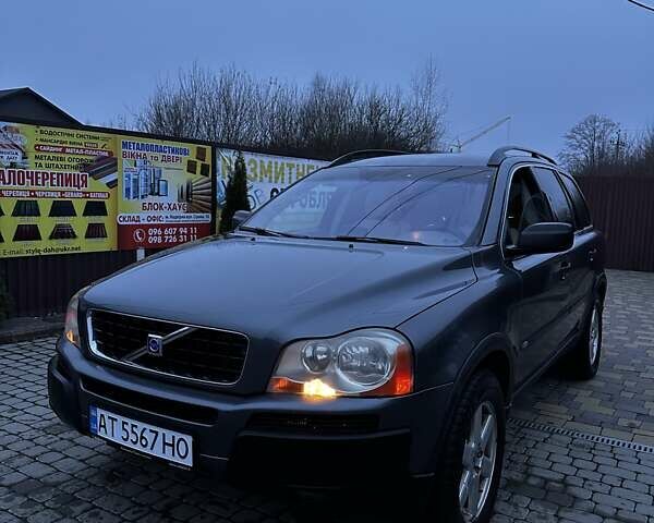 Серый Вольво ХС90, объемом двигателя 2.4 л и пробегом 402 тыс. км за 7500 $, фото 3 на Automoto.ua