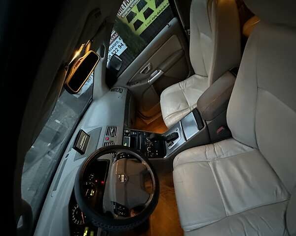 Серый Вольво ХС90, объемом двигателя 2.4 л и пробегом 402 тыс. км за 7500 $, фото 7 на Automoto.ua