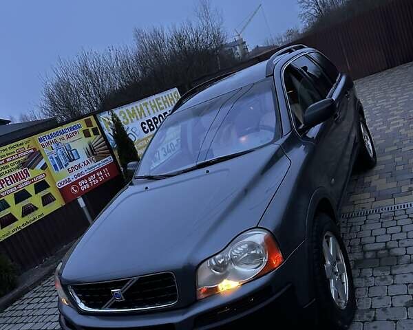 Серый Вольво ХС90, объемом двигателя 2.4 л и пробегом 402 тыс. км за 7500 $, фото 1 на Automoto.ua