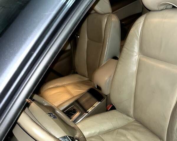 Серый Вольво ХС90, объемом двигателя 2.4 л и пробегом 402 тыс. км за 10350 $, фото 7 на Automoto.ua