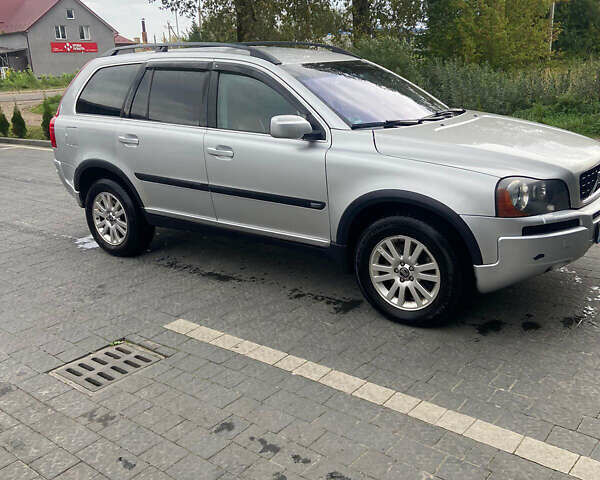 Серый Вольво ХС90, объемом двигателя 2.4 л и пробегом 290 тыс. км за 10800 $, фото 1 на Automoto.ua