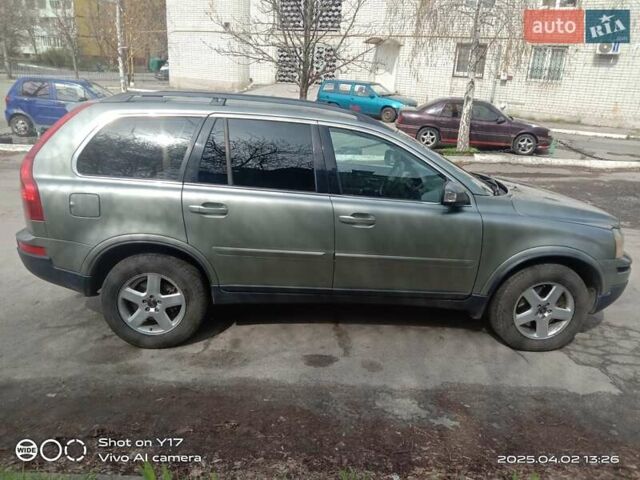 Серый Вольво ХС90, объемом двигателя 2.4 л и пробегом 372 тыс. км за 10500 $, фото 2 на Automoto.ua