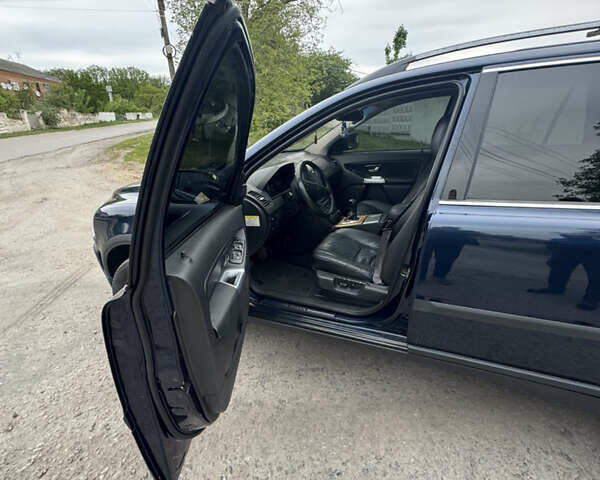 Синий Вольво ХС90, объемом двигателя 2.4 л и пробегом 318 тыс. км за 9200 $, фото 6 на Automoto.ua