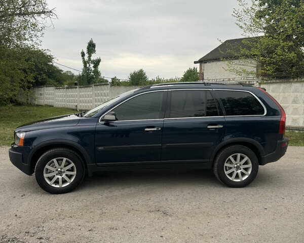 Синий Вольво ХС90, объемом двигателя 2.4 л и пробегом 318 тыс. км за 9200 $, фото 2 на Automoto.ua