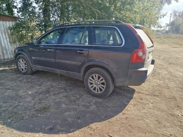 Синий Вольво ХС90, объемом двигателя 2.4 л и пробегом 315 тыс. км за 5800 $, фото 1 на Automoto.ua