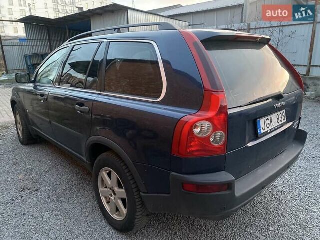 Синий Вольво ХС90, объемом двигателя 2.4 л и пробегом 265 тыс. км за 5300 $, фото 3 на Automoto.ua