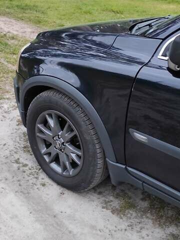 Синий Вольво ХС90, объемом двигателя 2.4 л и пробегом 458 тыс. км за 10500 $, фото 1 на Automoto.ua