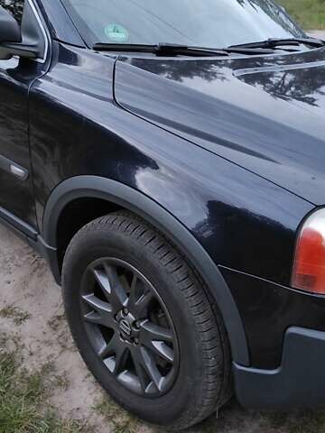 Синий Вольво ХС90, объемом двигателя 2.4 л и пробегом 458 тыс. км за 10500 $, фото 7 на Automoto.ua