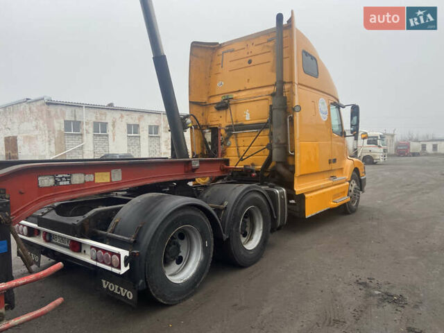 Желтый Вольво VNL 660, объемом двигателя 12.1 л и пробегом 1000 тыс. км за 25500 $, фото 24 на Automoto.ua