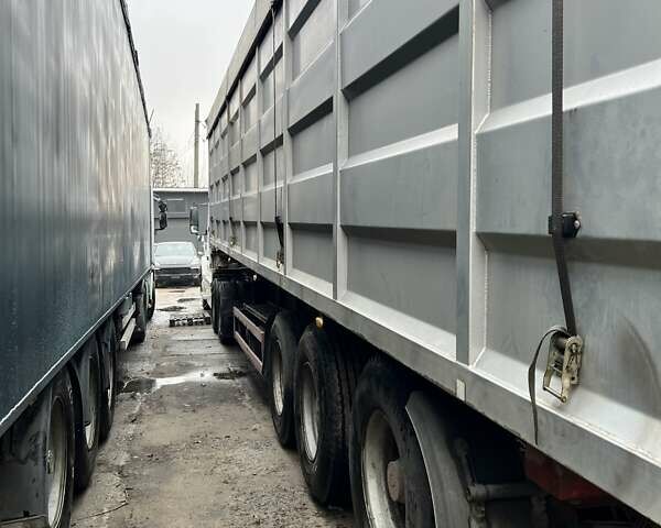 Белый Вольво VNL 670, объемом двигателя 12.13 л и пробегом 710 тыс. км за 10000 $, фото 2 на Automoto.ua
