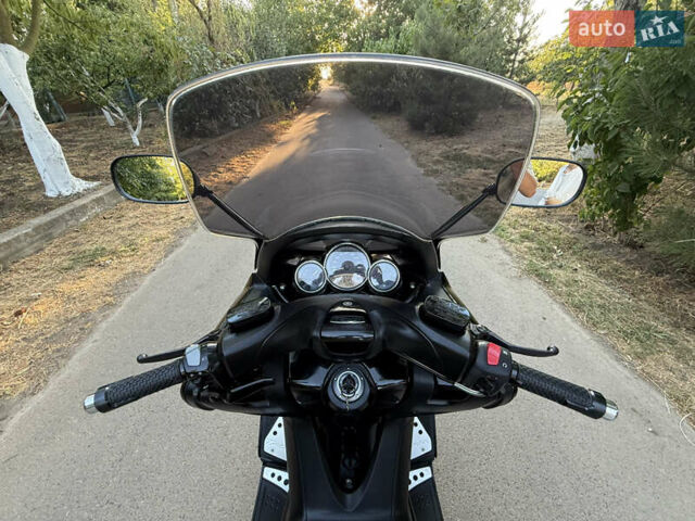 Черный Ямаха Т-макс, объемом двигателя 0.5 л и пробегом 19 тыс. км за 5999 $, фото 37 на Automoto.ua