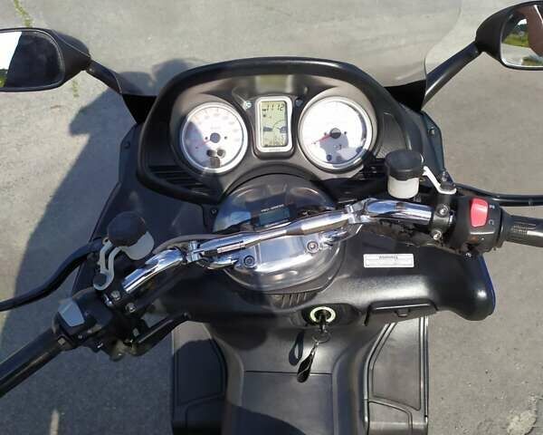 Синий Ямаха T-Max 500, объемом двигателя 0.5 л и пробегом 40 тыс. км за 4700 $, фото 5 на Automoto.ua