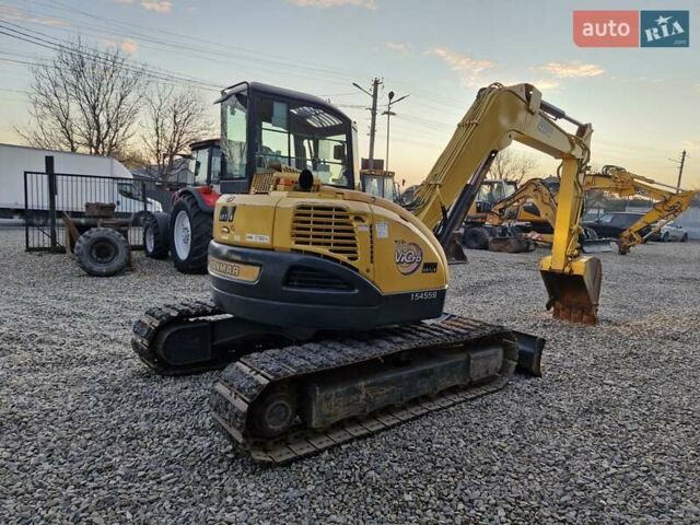 Желтый Янмар VIO 70, объемом двигателя 0 л и пробегом 290 тыс. км за 40698 $, фото 5 на Automoto.ua