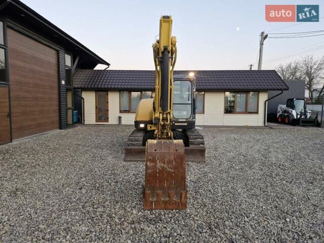 Желтый Янмар VIO 70, объемом двигателя 0 л и пробегом 290 тыс. км за 40698 $, фото 7 на Automoto.ua