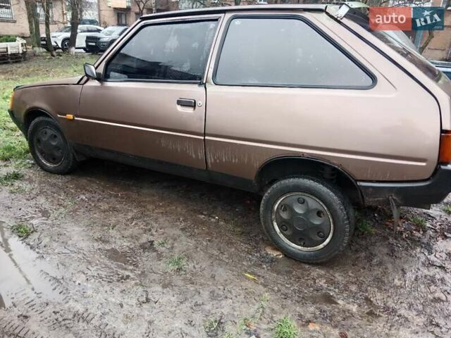 Коричневий ЗАЗ 1102 Таврія, об'ємом двигуна 1.1 л та пробігом 300 тис. км за 826 $, фото 2 на Automoto.ua