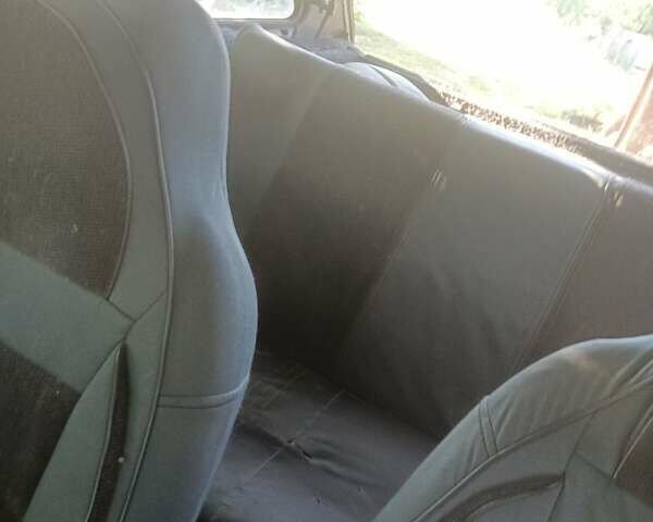 Красный ЗАЗ 1102 Таврия, объемом двигателя 1 л и пробегом 400 тыс. км за 437 $, фото 6 на Automoto.ua