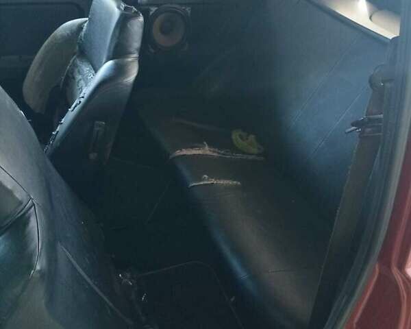 Красный ЗАЗ 1102 Таврия, объемом двигателя 1.1 л и пробегом 100 тыс. км за 900 $, фото 6 на Automoto.ua