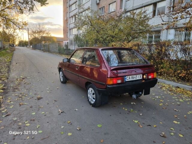 Красный ЗАЗ 1102 Таврия, объемом двигателя 1.1 л и пробегом 155 тыс. км за 1099 $, фото 2 на Automoto.ua