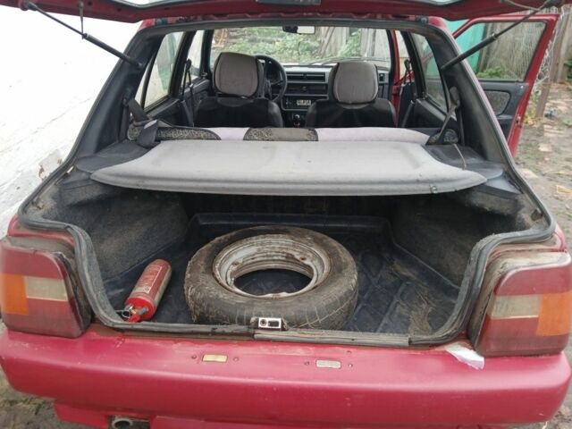 Красный ЗАЗ 1102 Таврия, объемом двигателя 1.2 л и пробегом 180 тыс. км за 700 $, фото 6 на Automoto.ua