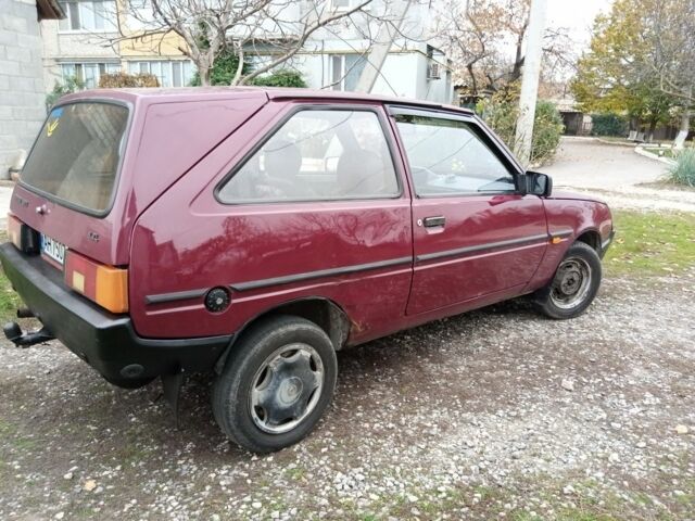 Красный ЗАЗ 1102 Таврия, объемом двигателя 1.2 л и пробегом 194 тыс. км за 950 $, фото 2 на Automoto.ua