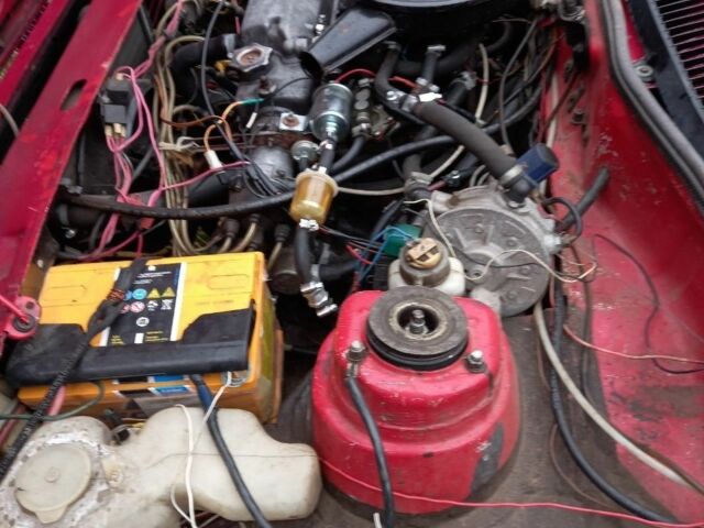 Червоний ЗАЗ 1102 Таврія, об'ємом двигуна 1.5 л та пробігом 190 тис. км за 1799 $, фото 6 на Automoto.ua