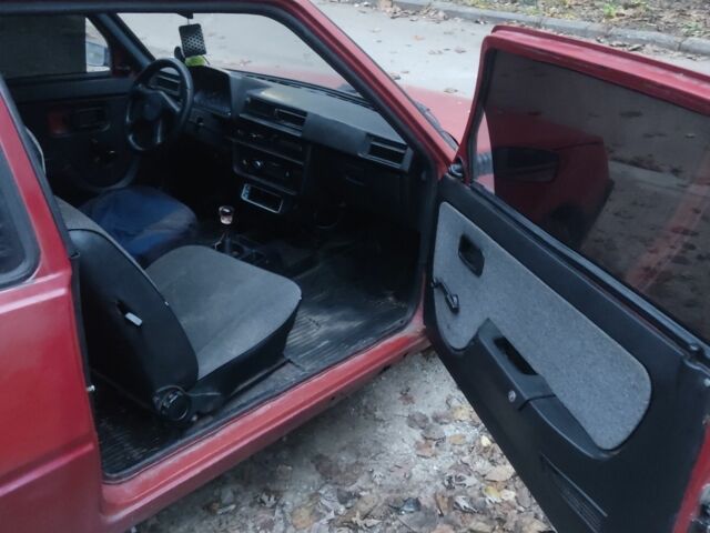 Красный ЗАЗ 1102 Таврия, объемом двигателя 1 л и пробегом 100 тыс. км за 284 $, фото 3 на Automoto.ua