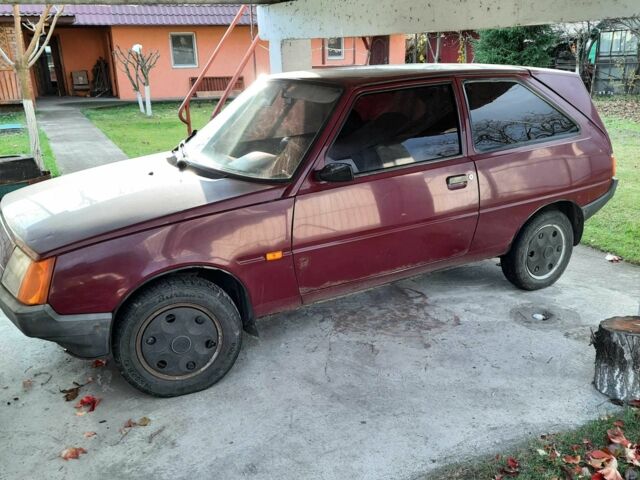 Червоний ЗАЗ 1102 Таврія, об'ємом двигуна 1.2 л та пробігом 250 тис. км за 592 $, фото 2 на Automoto.ua