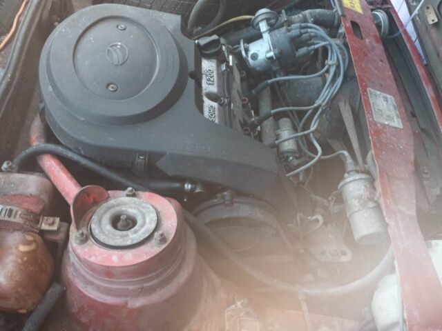 Красный ЗАЗ 1102 Таврия, объемом двигателя 1.2 л и пробегом 210 тыс. км за 1070 $, фото 3 на Automoto.ua