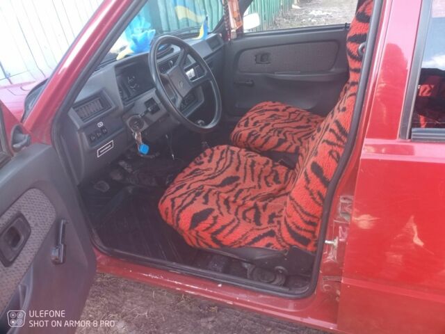 Красный ЗАЗ 1102 Таврия, объемом двигателя 1.2 л и пробегом 210 тыс. км за 1070 $, фото 6 на Automoto.ua