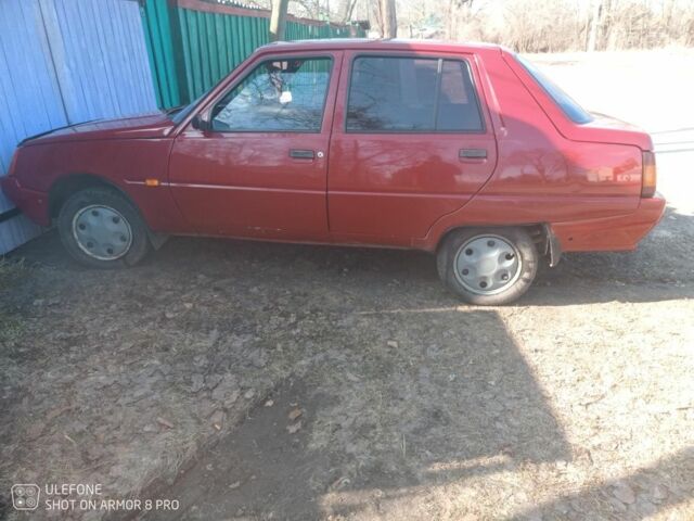 Красный ЗАЗ 1102 Таврия, объемом двигателя 1.2 л и пробегом 210 тыс. км за 1070 $, фото 5 на Automoto.ua