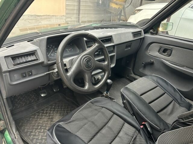 Зеленый ЗАЗ 1102 Таврия, объемом двигателя 1 л и пробегом 150 тыс. км за 600 $, фото 5 на Automoto.ua