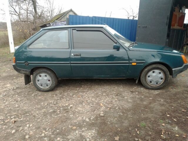 Зеленый ЗАЗ 1102 Таврия, объемом двигателя 1 л и пробегом 217 тыс. км за 950 $, фото 1 на Automoto.ua