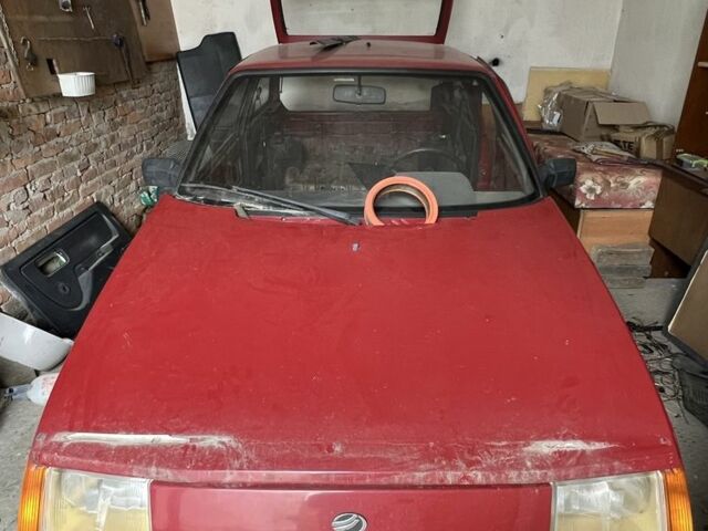 Красный ЗАЗ 1102 Таврия-Нова, объемом двигателя 1.1 л и пробегом 210 тыс. км за 650 $, фото 1 на Automoto.ua