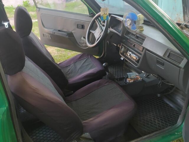 Зелений ЗАЗ 1102 Таврия-Нова, об'ємом двигуна 1.2 л та пробігом 100 тис. км за 831 $, фото 10 на Automoto.ua