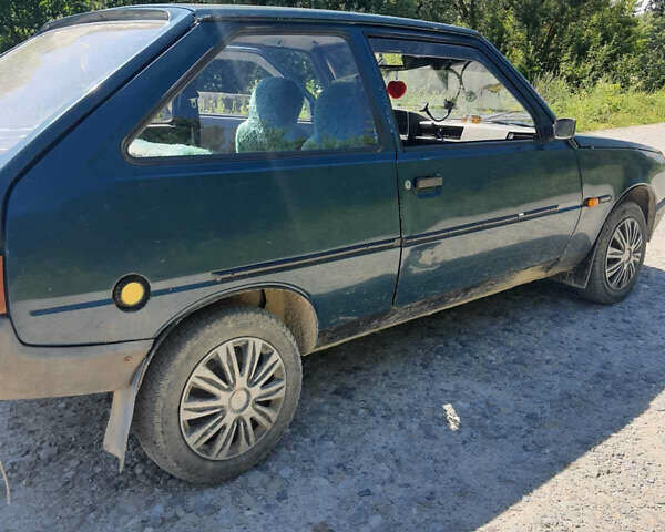 Зелений ЗАЗ 1102 Таврія-Нова, об'ємом двигуна 1.1 л та пробігом 150 тис. км за 1100 $, фото 3 на Automoto.ua