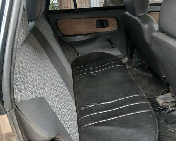 Бежевый ЗАЗ 1103 Славута, объемом двигателя 1.2 л и пробегом 200 тыс. км за 1000 $, фото 3 на Automoto.ua