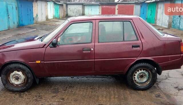 Красный ЗАЗ 1103 Славута, объемом двигателя 1.2 л и пробегом 325 тыс. км за 1250 $, фото 1 на Automoto.ua
