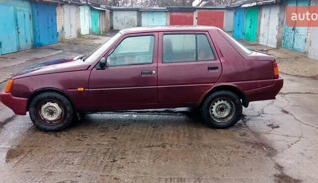 Красный ЗАЗ 1103 Славута, объемом двигателя 1.2 л и пробегом 325 тыс. км за 1250 $, фото 2 на Automoto.ua