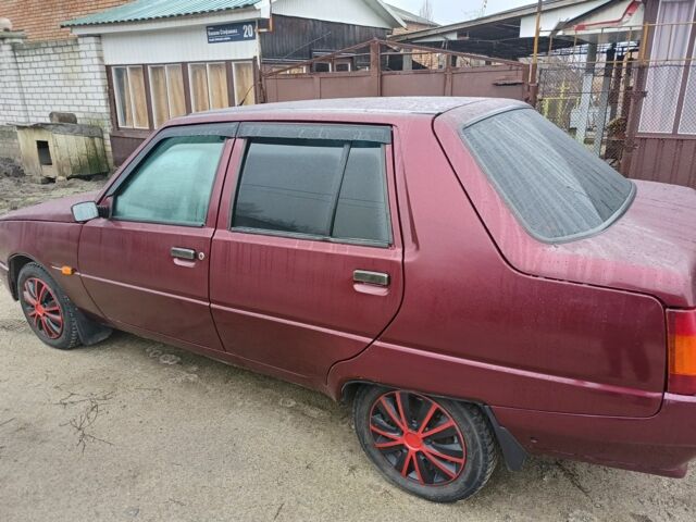 Червоний ЗАЗ 1103 Славута, об'ємом двигуна 1.2 л та пробігом 64 тис. км за 1396 $, фото 3 на Automoto.ua